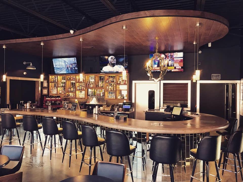 Bar with chairs at Coffee and Cocktails