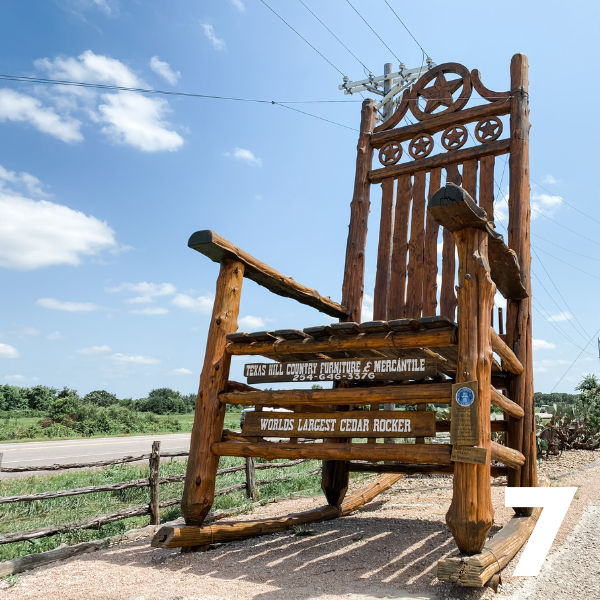 Natty Flats Smokehouse in front of the World’s Largest Cedar Rocking Chair