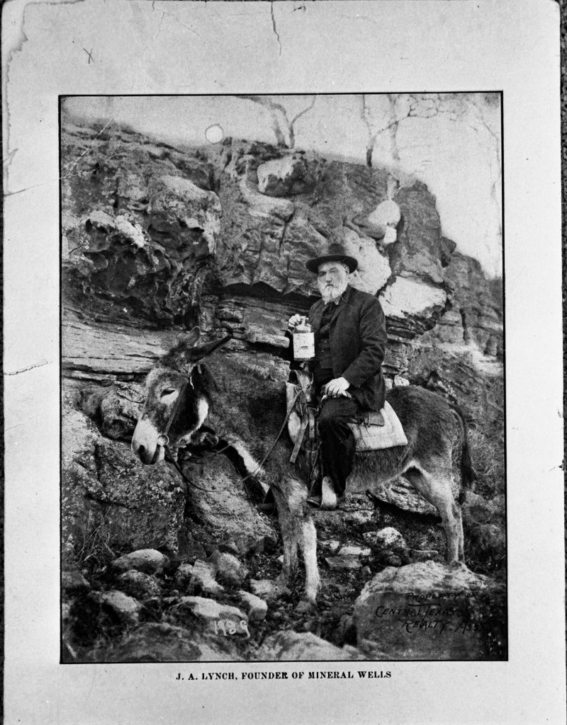 James Alvis Lynch on a Mule with a bottle of crazy water