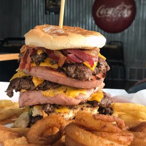 Meat Monster - Multi-meat hamburger with onion rings and fries