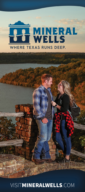 Man and woman at overlook with lake in background at Mineral Wells 
State Park