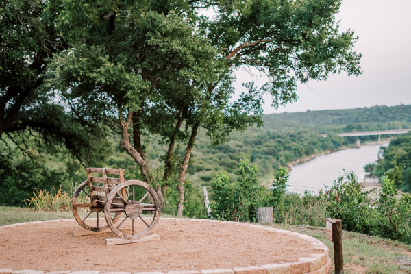 Bench overlooking river and trees