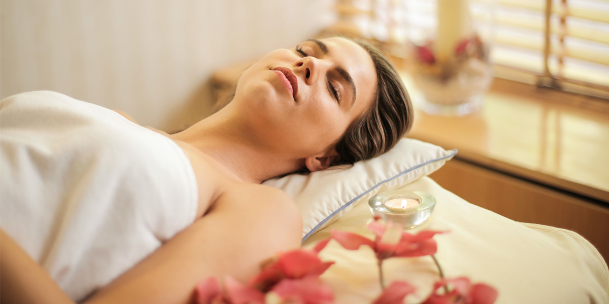 Woman relaxing on Massage table