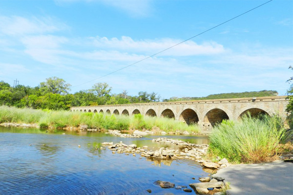 Brazos river stone bridge with arches