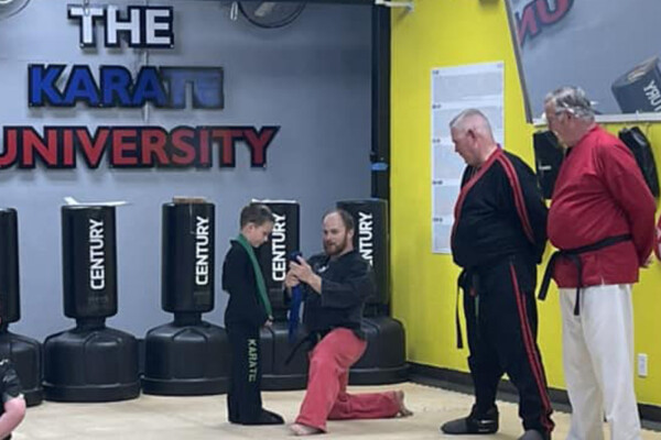 Karate instructors giving instruction at Michael Lovell's American Karate